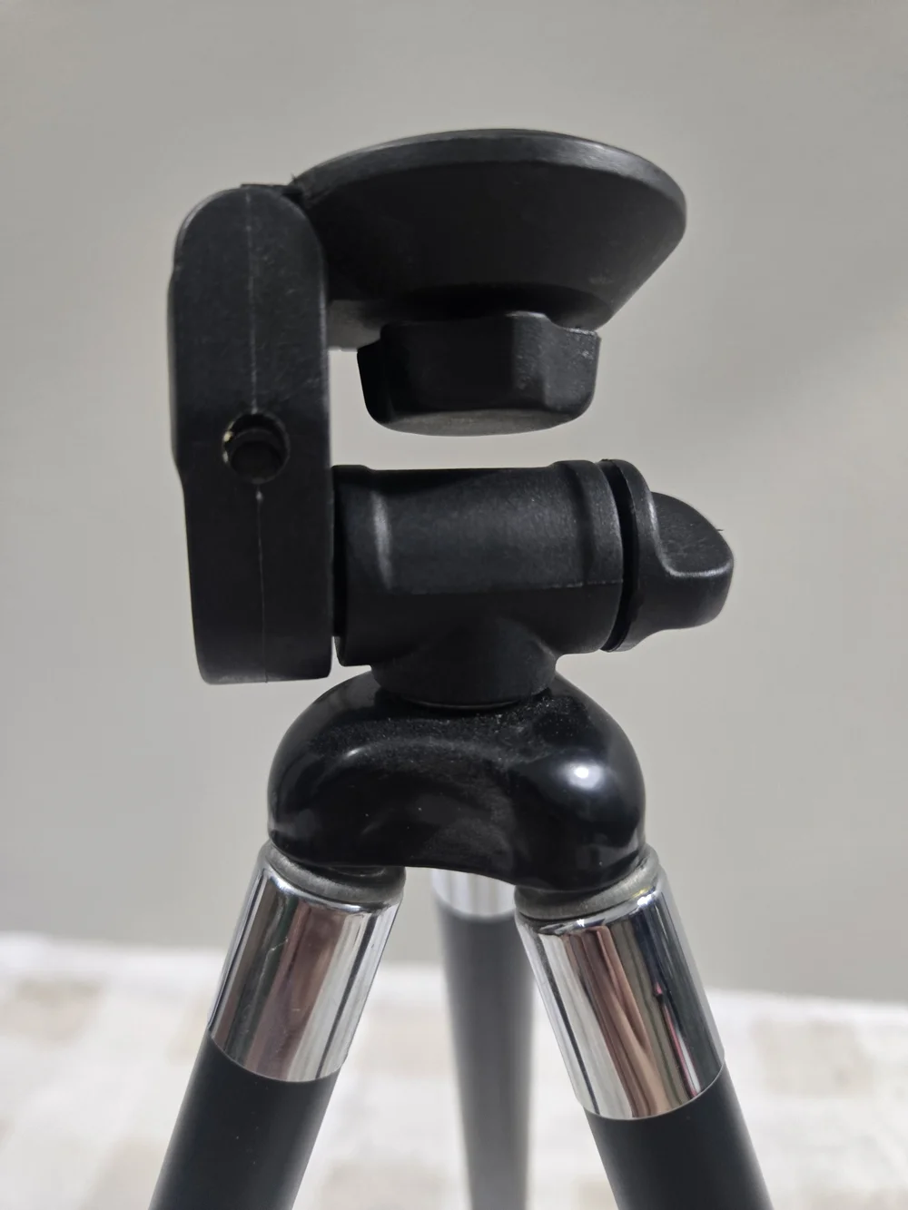 Compact Black Camera Tripod with Adjustable Head